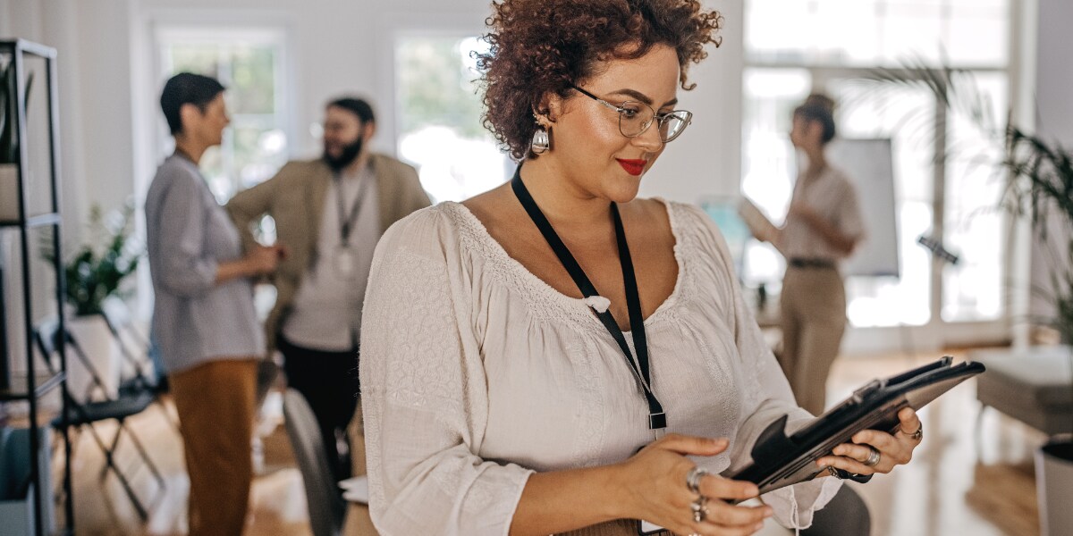 AP leader holding a tablet