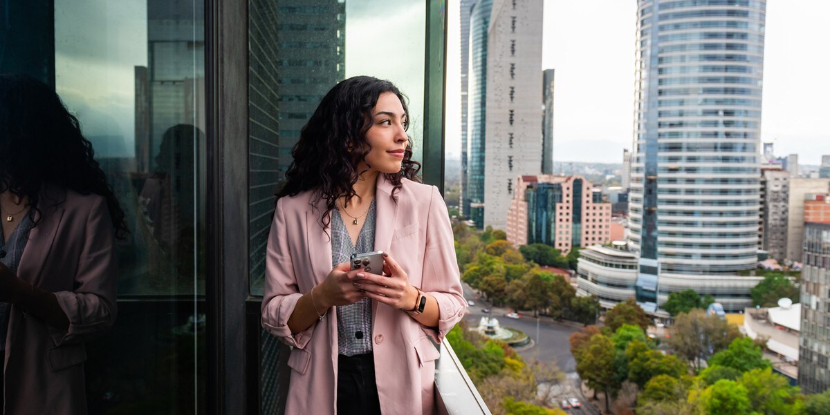 woman looking away from rooftop