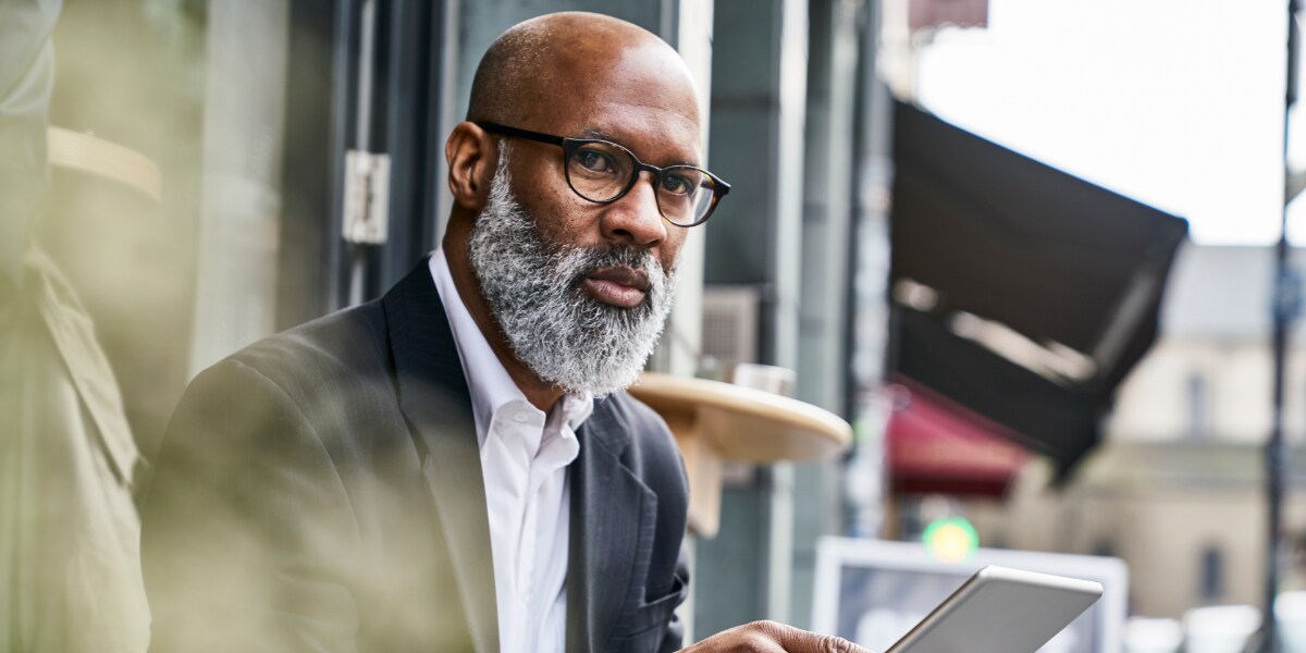 a CFO holding a tablet