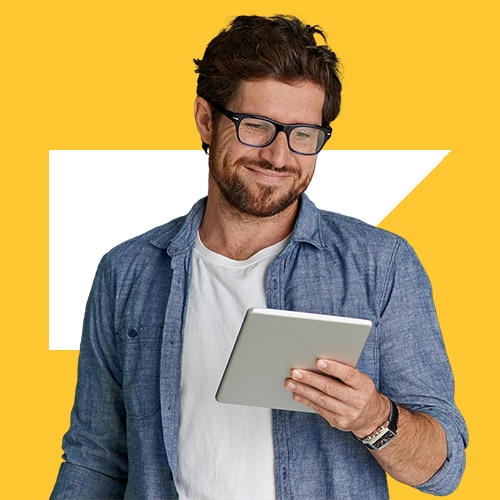 man looking at tablet