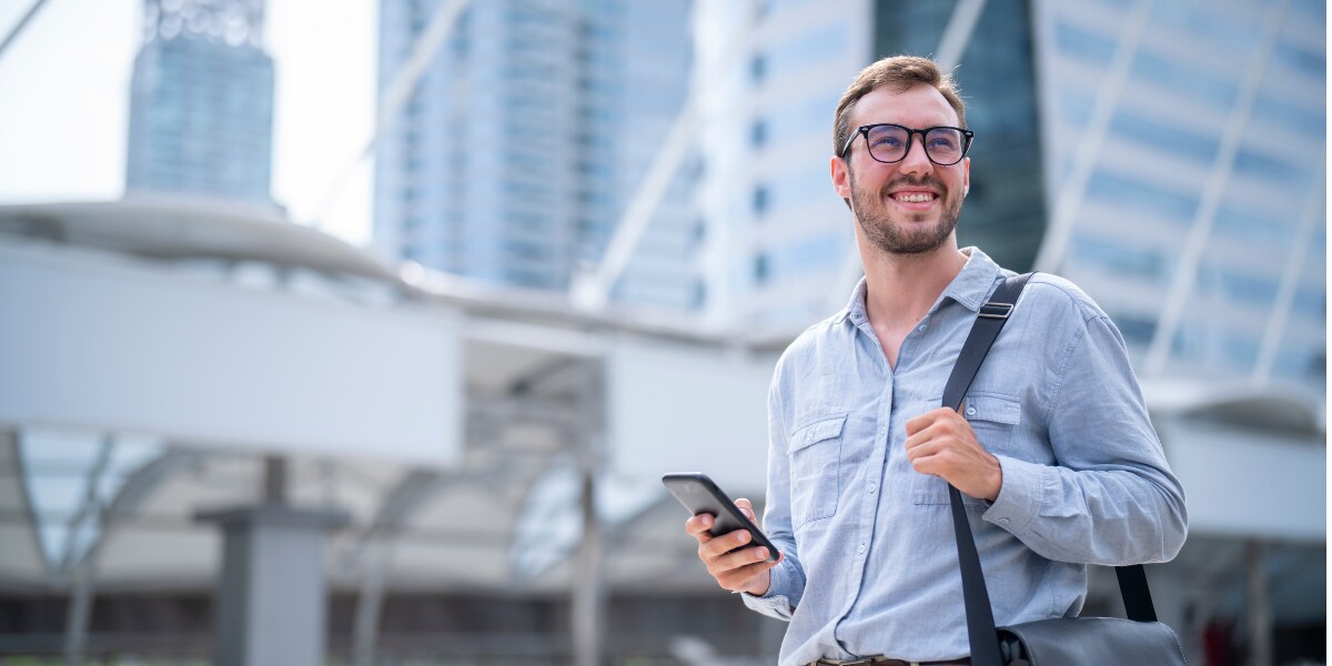 a business traveler in front of office buildings
