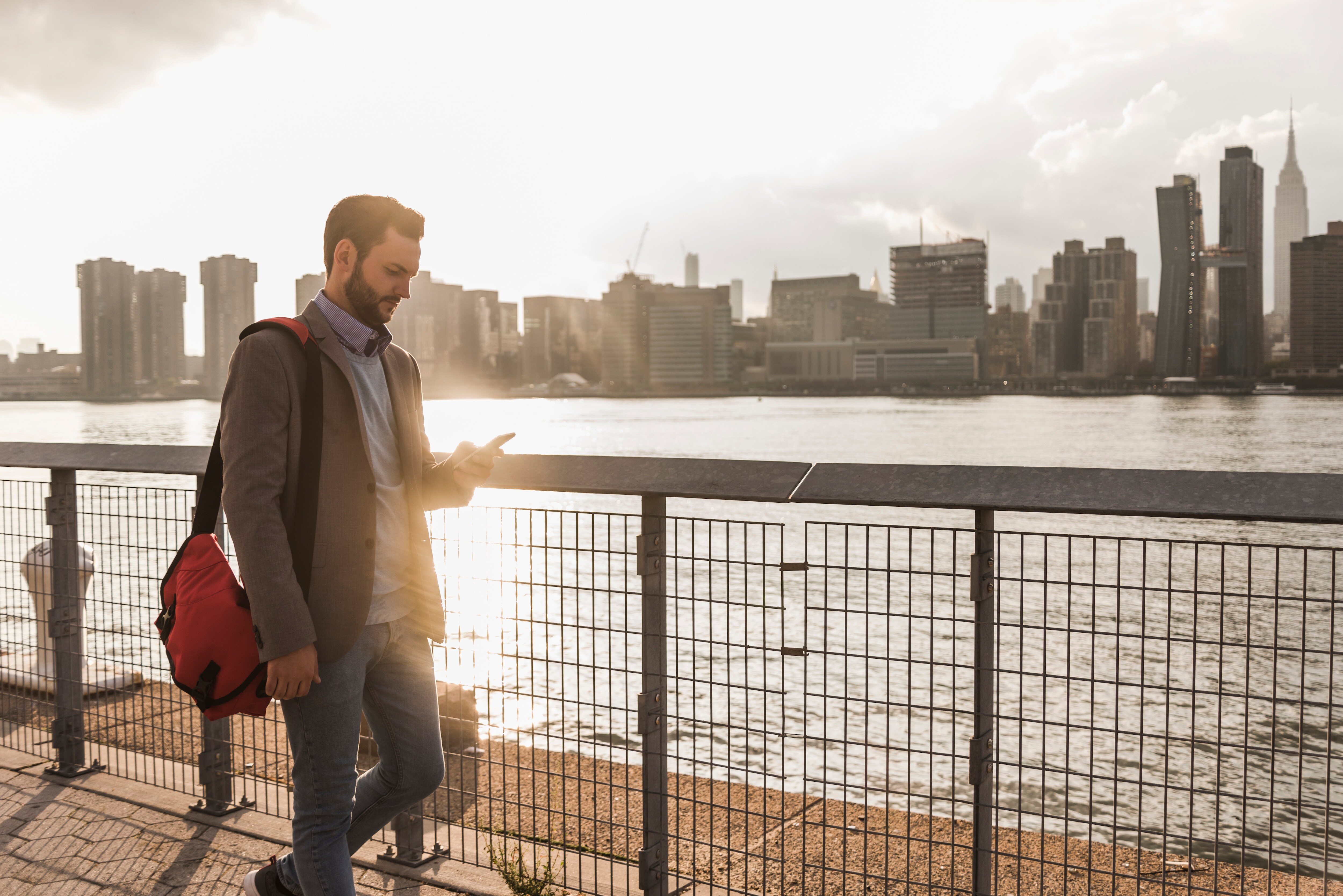 man walking, cityscape, skyline, traveler