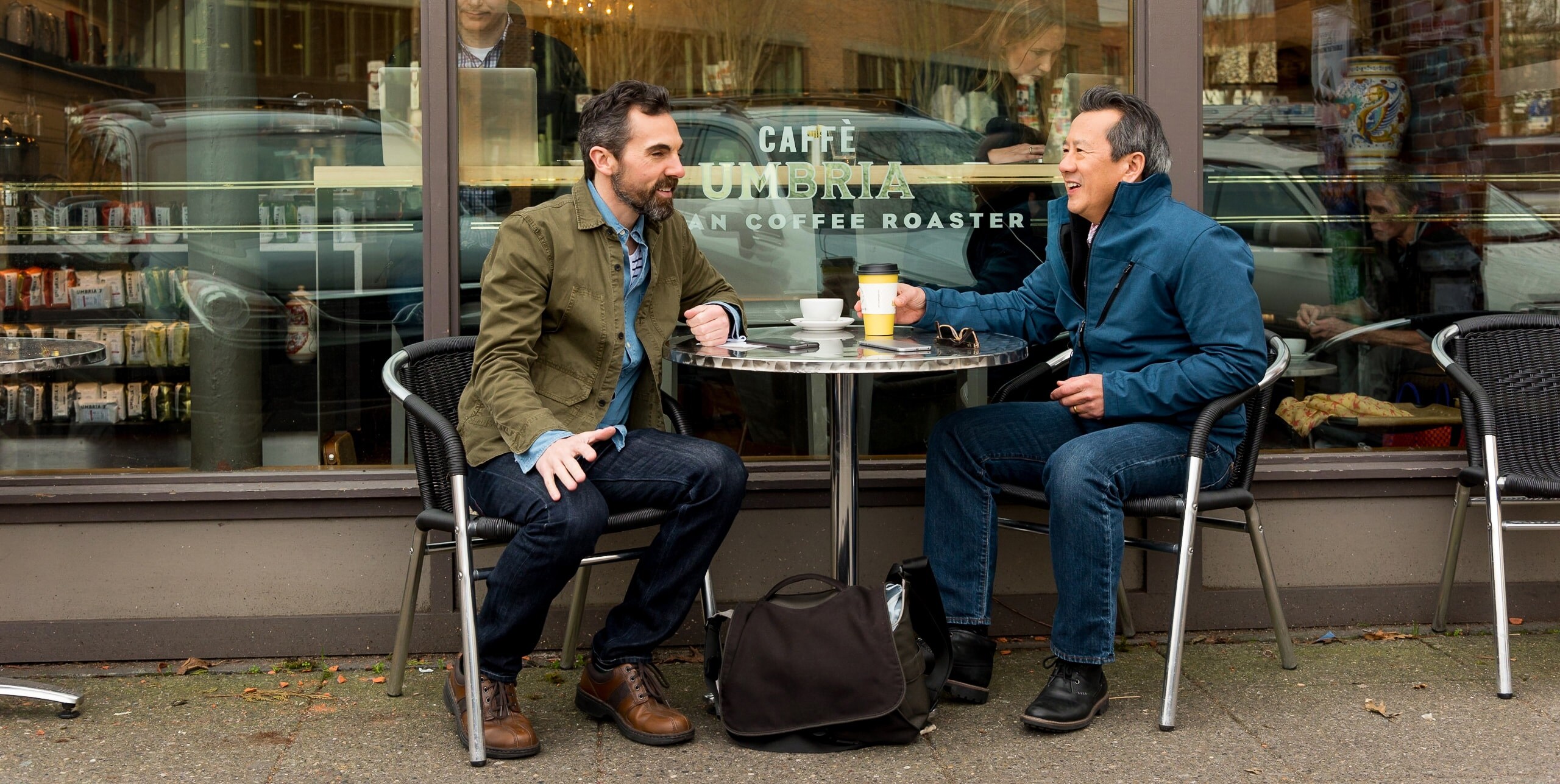 business travelers meeting for coffee