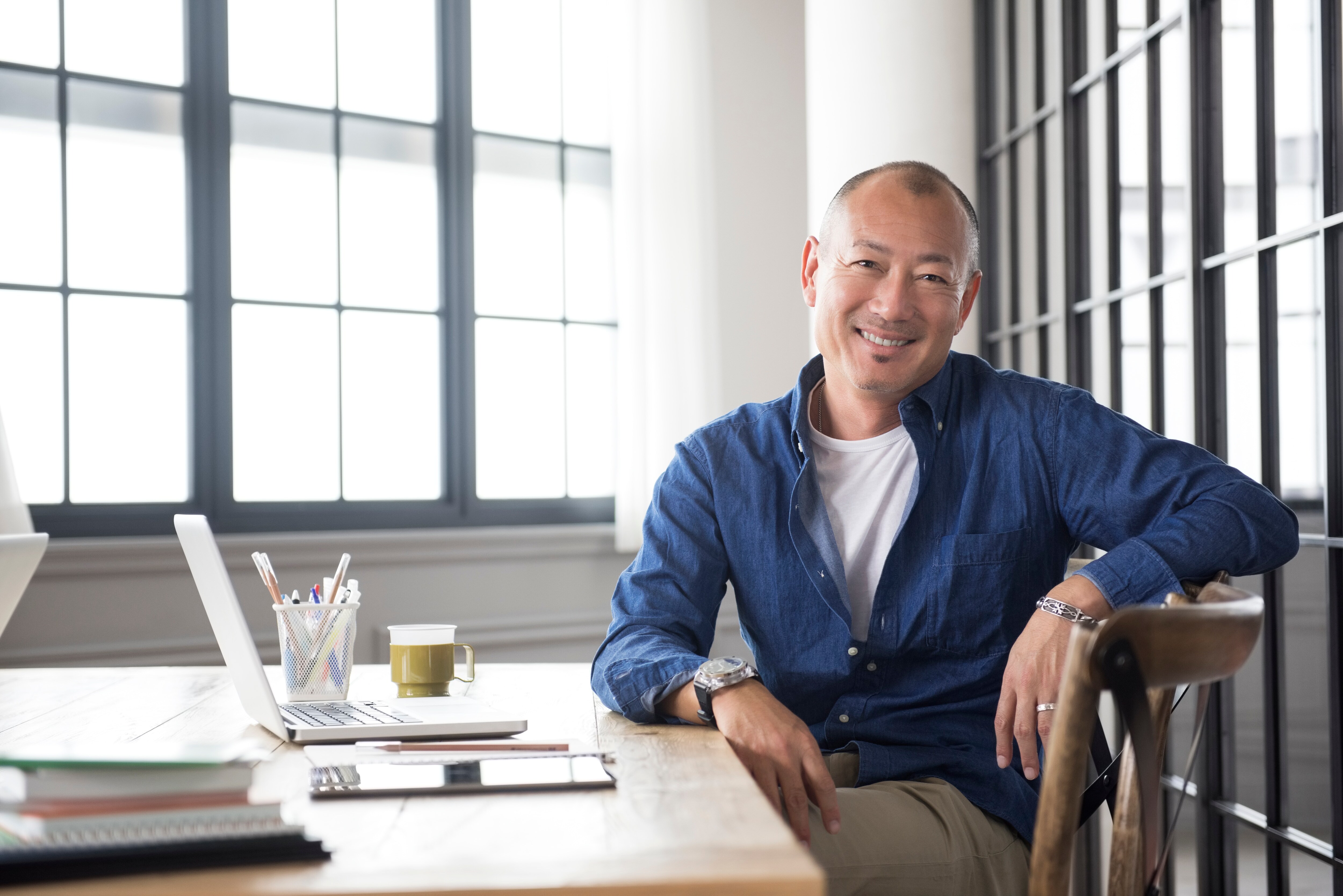 a business leader sitting in a meeting room