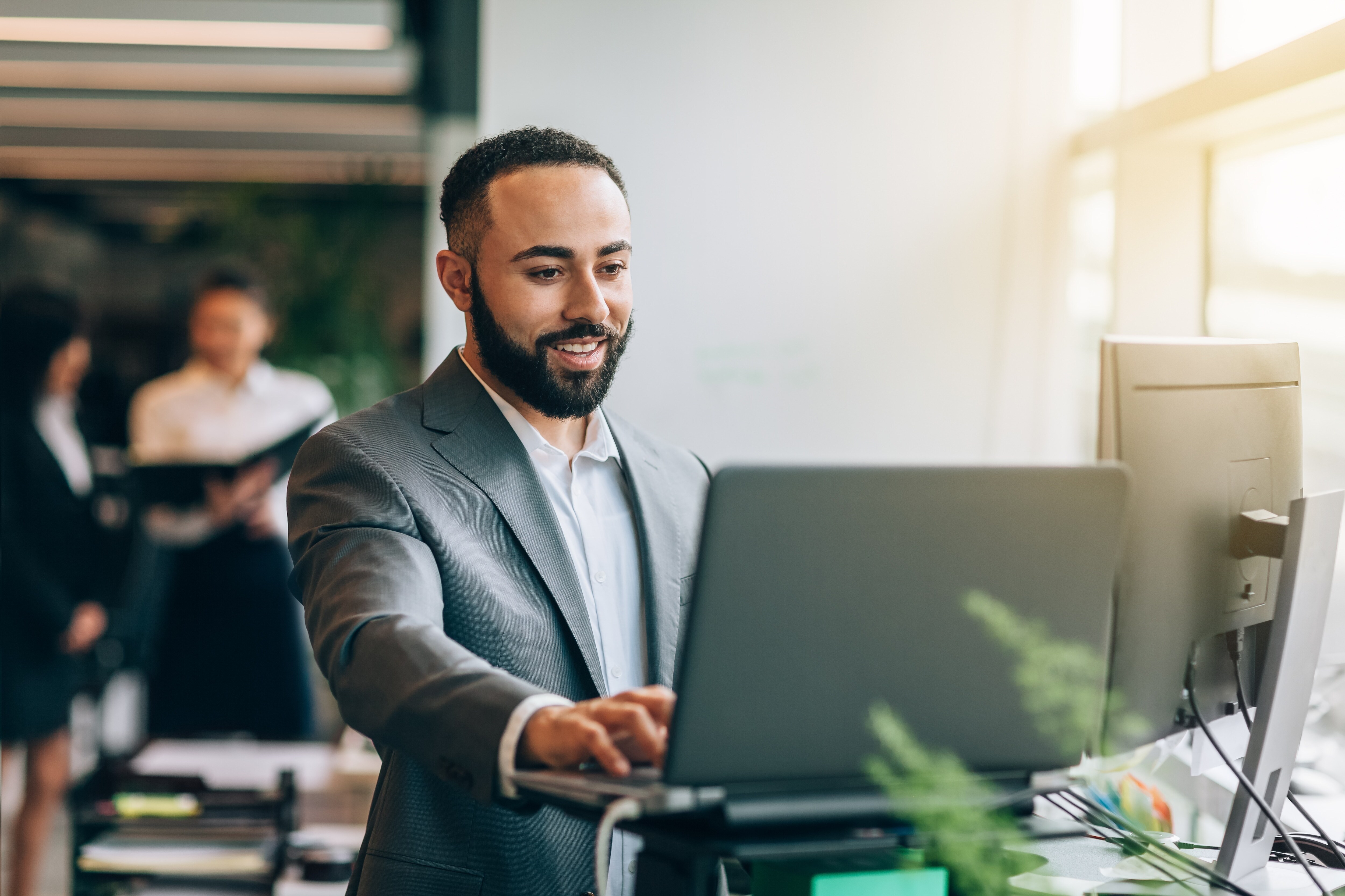 Man looking at computer in an office