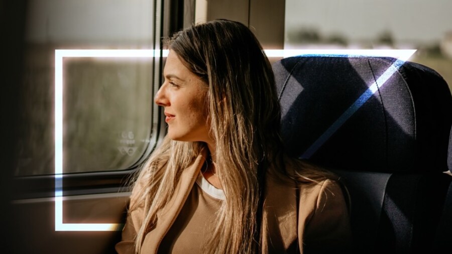 woman looking out window