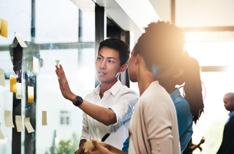 group of people working on screen